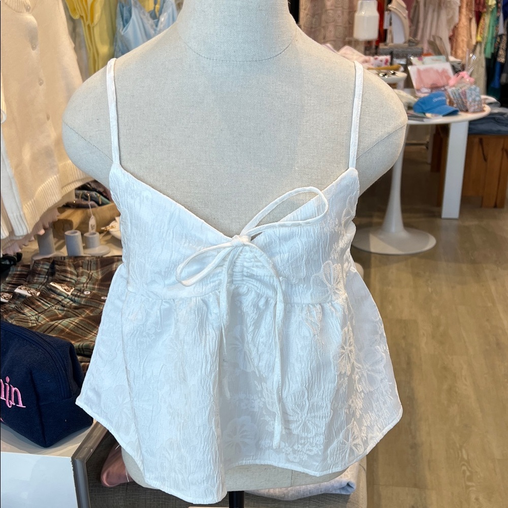 Chic White Floral Camisole by [Brand]